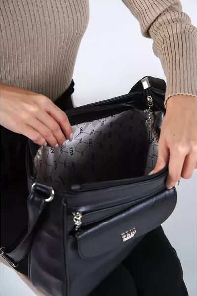 Borsa da donna nera a tracolla con molte tasche laterali