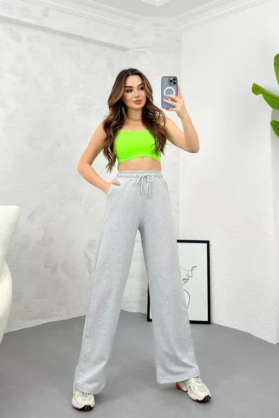 بنطال رياضي نسائي رمادي فضفاض واسع مريح بفصوص جانبية وجيوب جانبية