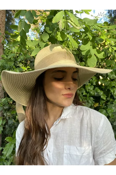 Beige straw cloche hat with a scarf