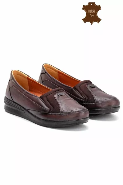 المرأة من الداخل إلى الخارج جلد طبيعي العظام أحذية الأم المرنة