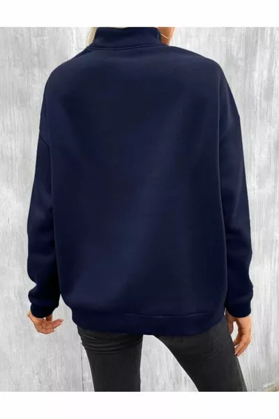 Bedrukte marineblauwe trui met opstaande kraag en halve rits