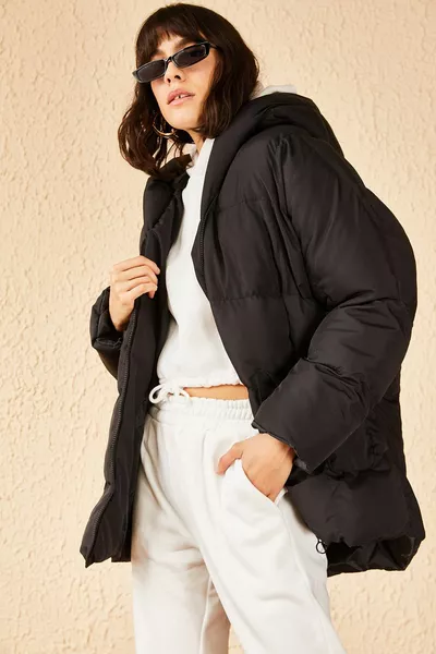 Doudoune oversize noire à double poche à capuche pour femme