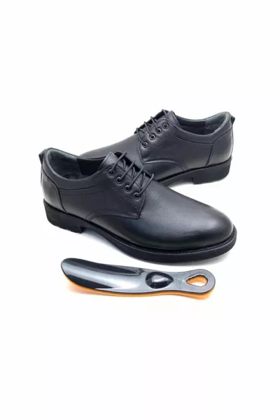 الجلود العظام السوداء الشتاء أحذية الرجال