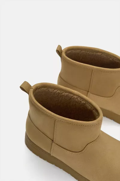 حذاء بوت مسطح مبطن بطول الكاحل