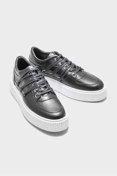 حذاء رياضي رجالي جلد أسود