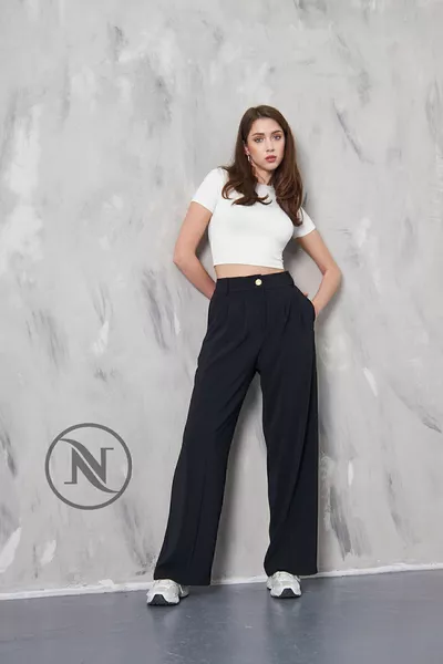 PANTALON PALAZZO PLISSÉ À BOUTONS DORÉS