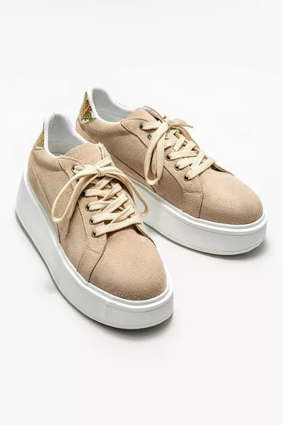 حذاء رياضي نسائي جلد بيج