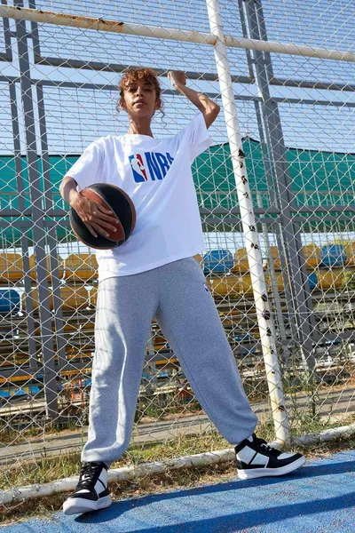 قميص فضفاض أبيض للجنسين من القطن %