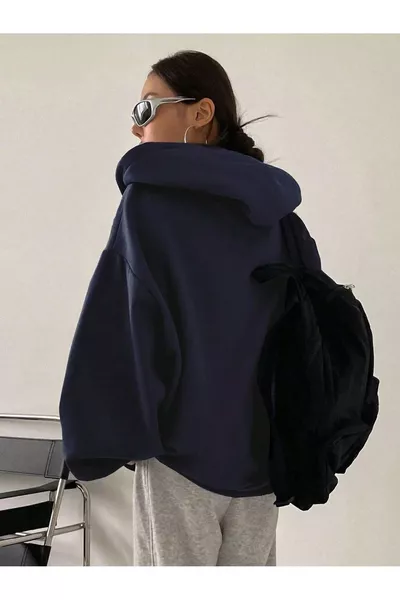 Gilet pour femme à manches ballon avec fermeture éclair et capuche bleu marine