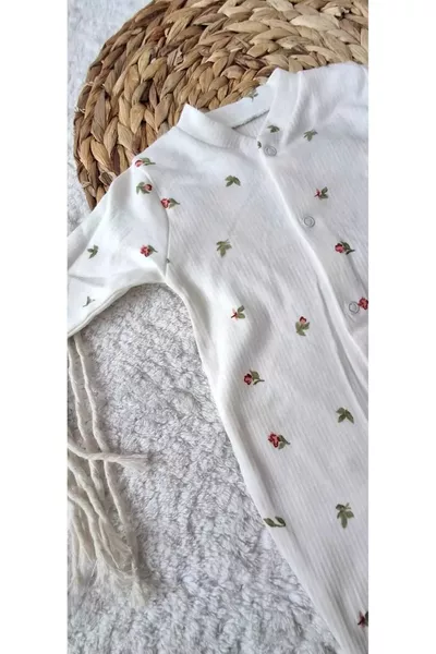 Tutina per neonata con bottoni e piedini, a tema fiori croccanti