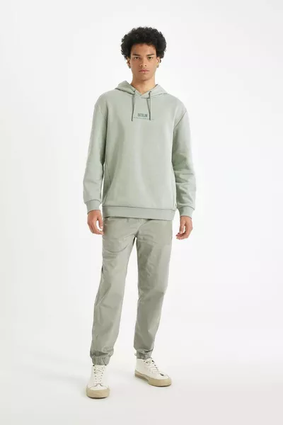 سويت شيرت سميك بغطاء رأس واسع ومطبوع ريلاكس WN