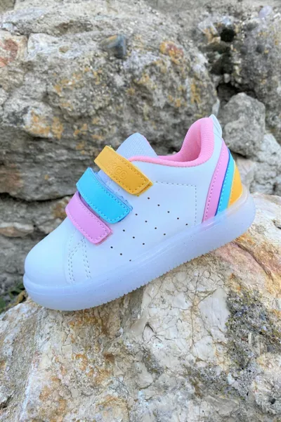 حذاء رياضي بأرضية تقويمية مع إضاءة LED باللون الأبيض (المقاسات من  إلى )