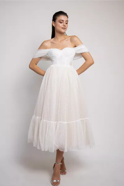 أبيض البولكا نقطة مساء اللباس