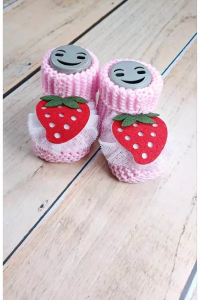Bottines en maille pour bébé rose clair