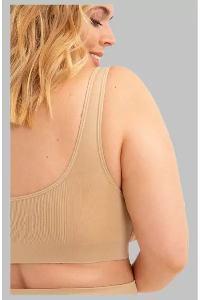 Сутиен с подплънки в телесен цвят, с широки презрамки, оформящ, предотвратяващ отпускането и стягащ бюста
