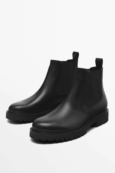 Stivaletti in nappa con cinturini laterali