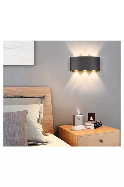 Decoratieve en dubbelzijdige binnen- en buitenmuurspot met zwarte behuizing en amberkleurig licht - 1 stuk