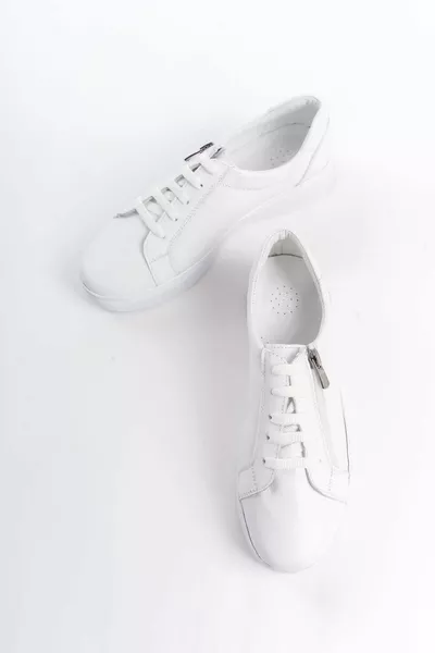 جلد طبيعي أبيض تشريحي الراحة نعل الرياضة عارضة أحذية نسائية 