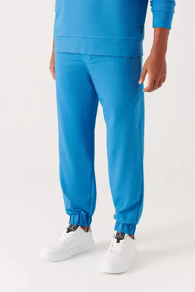 سروال رياضي رجالي بكحلي غامق، بحزام قابل للربط، جيوب جانبية، أطراف مطاطية، من قماش قطني مزدوج الخيط 