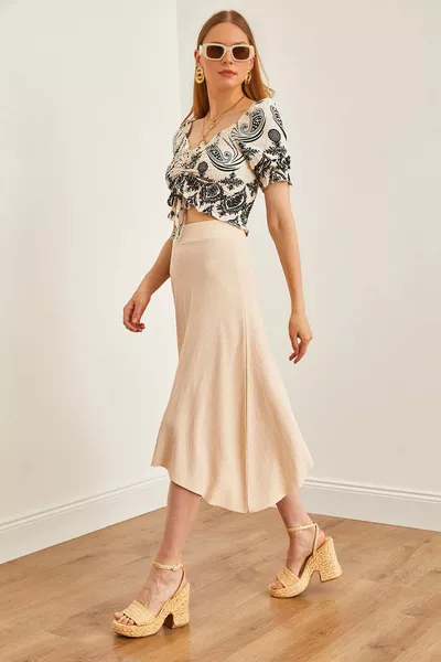 Jupe asymétrique élastiquée taille pierre femme 