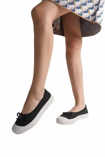 ملابس تريكو نسائية باليه مسطحة مع قوس أسود