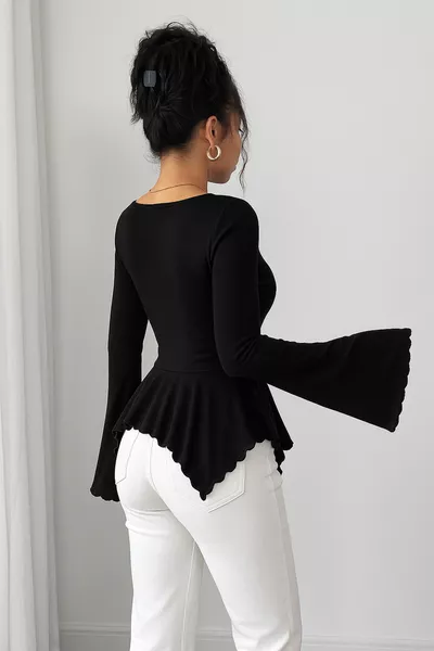 تنورة طويلة سوداء إسبانية بأكمام طويلة مع بلوزة علوية مطاطية