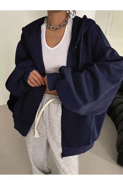 Gilet pour femme à manches ballon avec fermeture éclair et capuche bleu marine