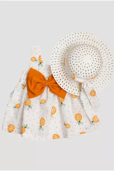 Meisjesbabyjurk met grote ananasprint en hoed