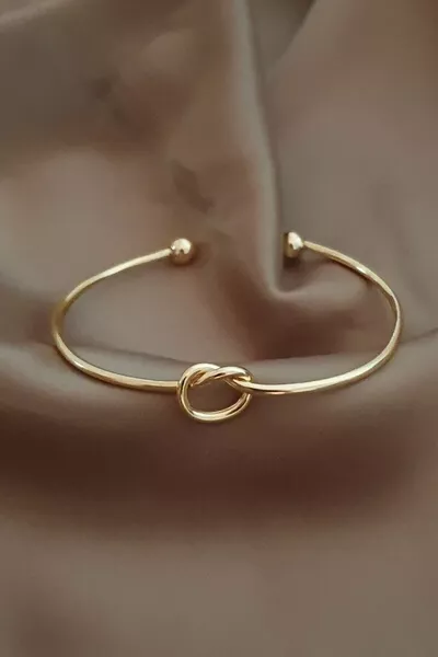Gold Color Women's Bracelet with Gold Knot Detail and Adjustable Cuff