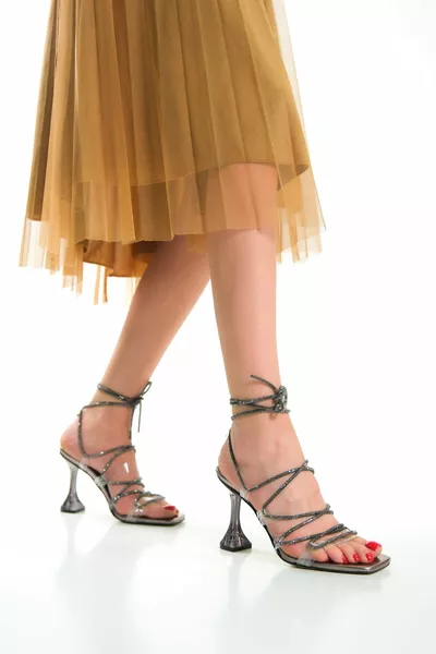 المرأة مساء اللباس الصنادل /البلاتين/