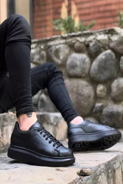 Schwarze Herren-Sneakers aus Leder mit hoher Schnürsohle und hoher Sohle