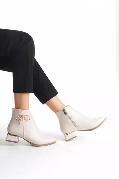 Talons courts Fermeture éclair Nœud en métal Détail Bottines pour femmes Bottines