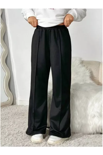 Комплект зимних спортивных штанов с двумя вариантами низа – черный и серый