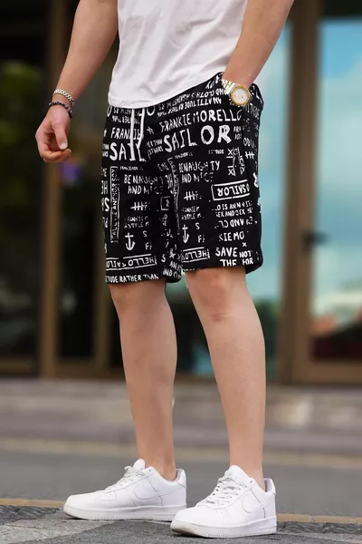 Schwarze Caprihose mit Aufdruck 