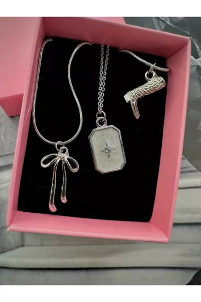 Set di collane in acciaio color argento Fiocco-Stella del Nord-Stivale