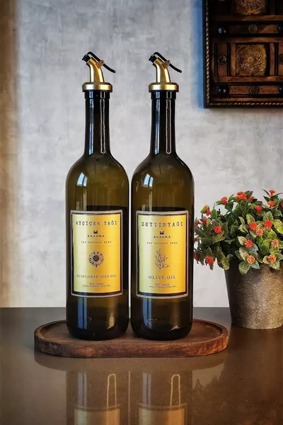 زيتون وزجاجة زيت سائل من خشب العنبر الذهبي بسعة  مل مع حامل خشبي 2 قطعة