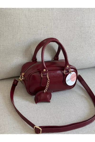 حقيبة كتف نسائية صغيرة بورغندي بتفاصيل جلدية صغيرة