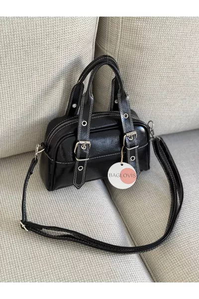 BLACK WOMEN'S SHOULDER BAG WITH ADJUSTABLE STRAPS AND BUCKLE DETAIL  