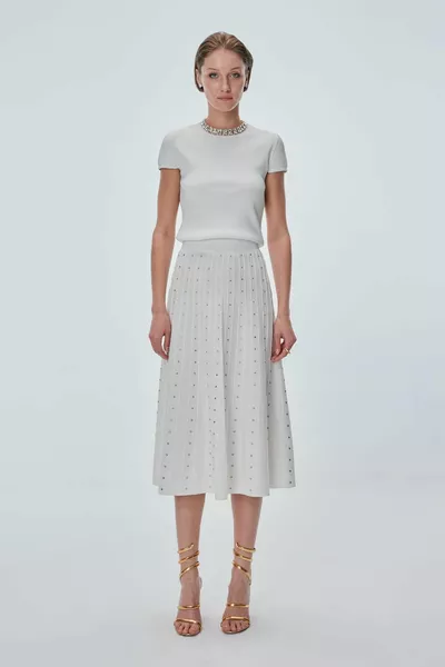 تنورة ميدي مطوية مطوية بالحجر