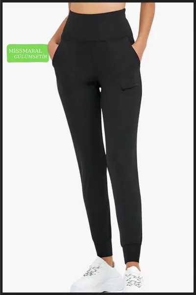 سروال رياضي نسائي أسود Curve Jogger قماش غوص خصر عالي مع جيوب مزدوجة 