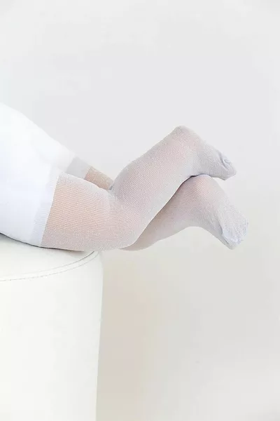 Chaussettes collantes blanches pailletées pour bébé fille