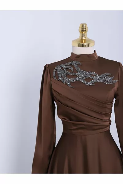 Evening dresses with stones on the collar and draped on the front