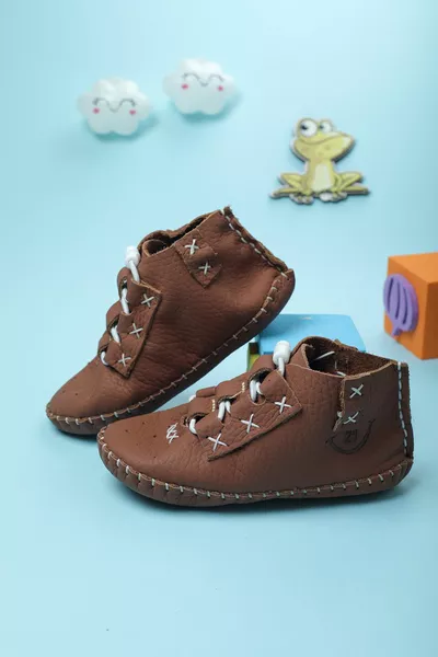 للجنسين حديثي الولادة كامل العظام جلد طبيعي تان أبيض أحذية الطفل مناسبة لصحة القدم