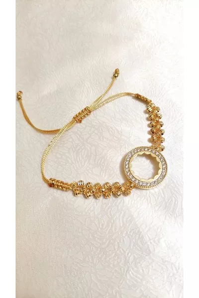 إطار سوار ربع دينار يُوضع فيه ربع دينار واحد