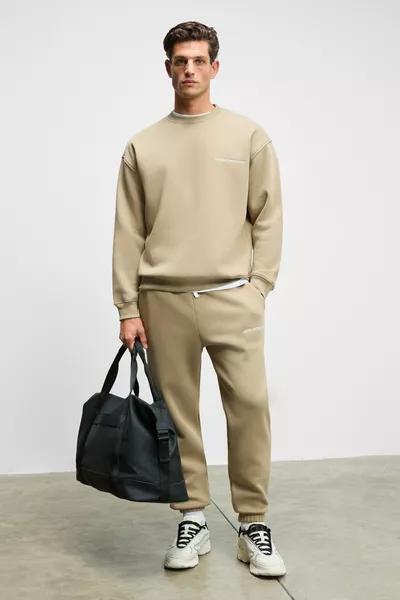 طقم رياضي رجالي مارشال من القطن مبطن من الداخل وبتطريز، باللون الرمادي الداكن، بقصة مريحة